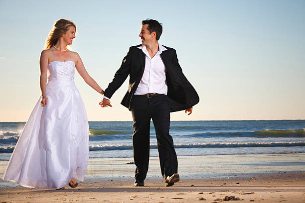 istock Wedding Couple Walking Together 175504335