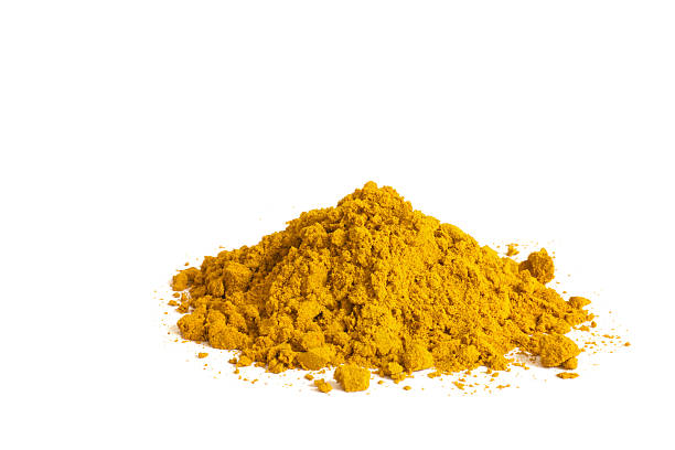istock heap of curry powder on white background 175504560