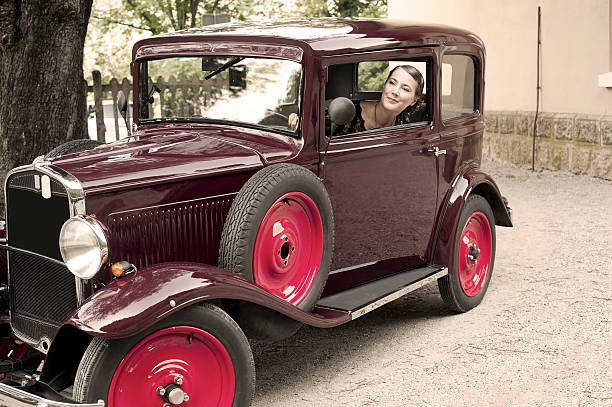 istock Woman in a Vintage Car 175505493