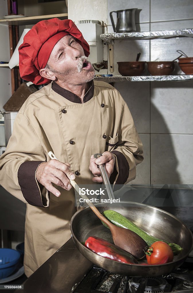 Crazy cooking Crazy chef at the kitchen Bizarre Stock Photo