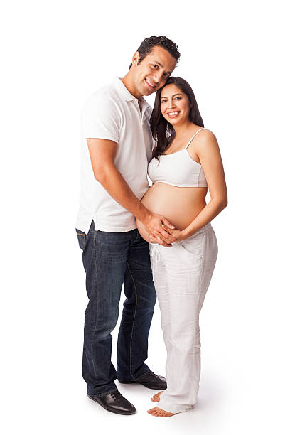 Cheerful pregnant couple Cheerful pregnant couple 8 months pregnant stock pictures, royalty-free photos & images