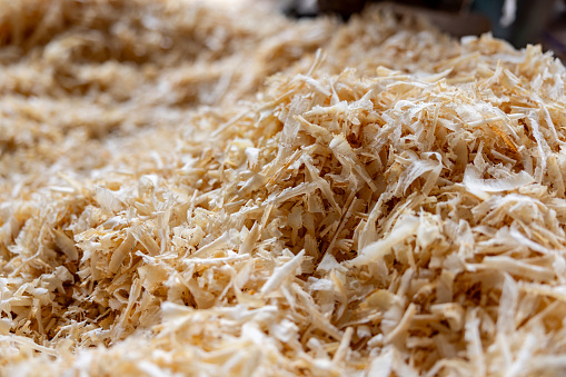 Sawdust at a carpentry or lumberyard - wood industry concepts