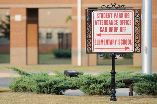 istock Student parking attendance office car drop off sign 175507525