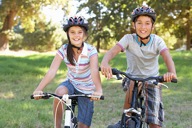 istock Two Children On Cycle Ride In Countryside 175507537