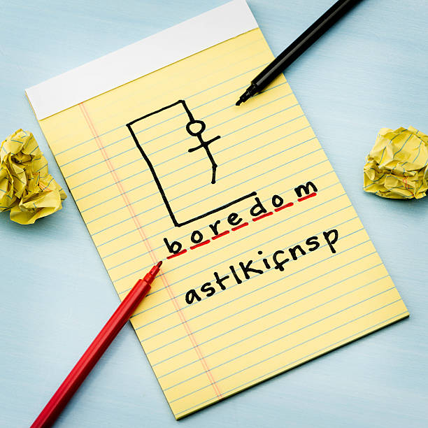 Playing Hangman A notebook with a hangman game in progress hangman stock pictures, royalty-free photos & images