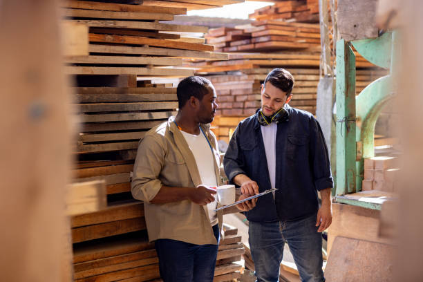 istock Workers talking on their coffee break at a lumberyard 1755076104