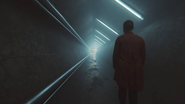 istock Young woman standing in spooky empty city corridor 1755076463