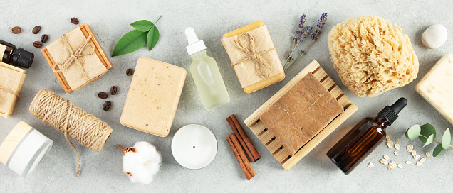 Sustainable lifestyle concept. Top view photo of natural hand made soap bar and eco friendly personal care products banner