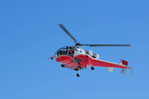 istock Red Color Helicopter with Blue Sky Background - XLarge 175509436
