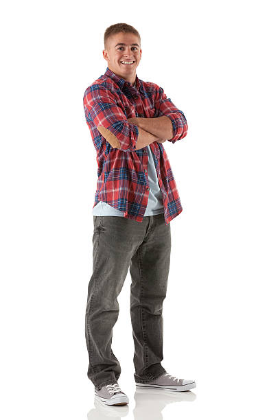 istock Happy man standing with his arms crossed 175509611