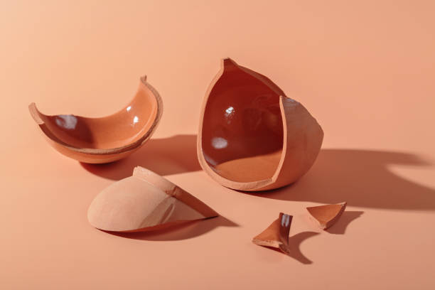 istock Details of broken ceramic cup on beige background 1755099434