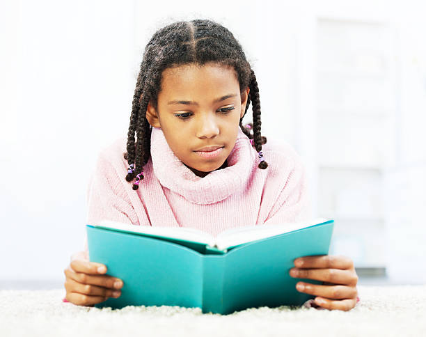 istock Young happy teenager reading a book. 175510232