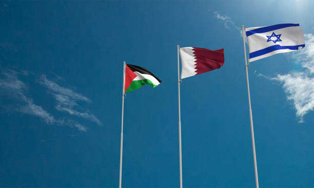 istock israel qatar palestine flag waving cloud blue sky background wallpaper copy space empty freedom war military gaza city vs soldier government politic business middle east aid fight support independence 1755110274
