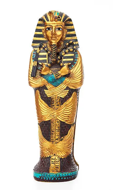 "Replica of Tutankhamen's tomb, isolated on white background."