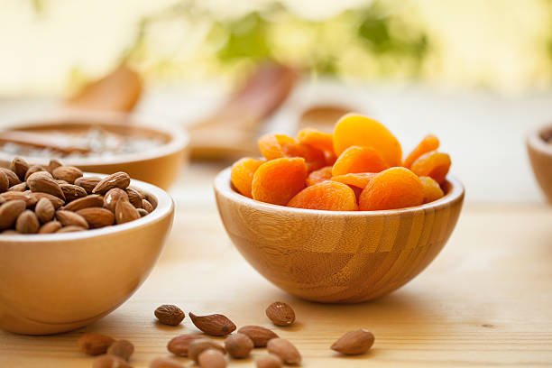 Dried apricots and almonds stock photo
