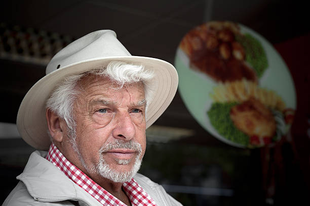 istock Elderly English man sitting a restaurant 175512210