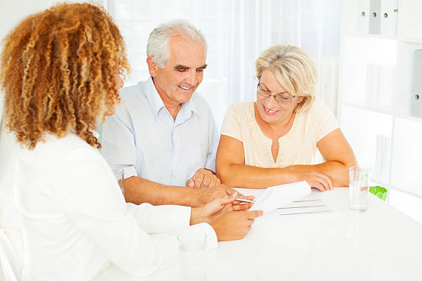 istock Senior Couple Meeting with Financial advisor. 175512357
