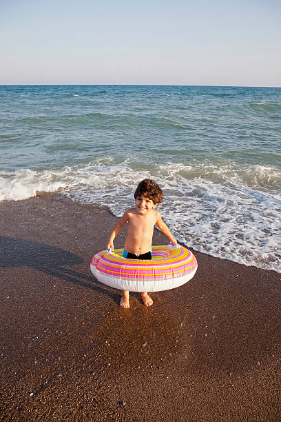 istock Little boy on the beach 175512470