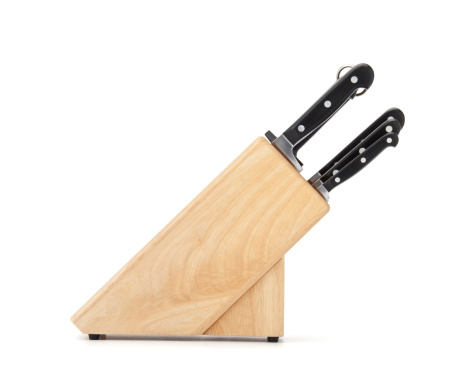 a wooden knife block isolated on white
