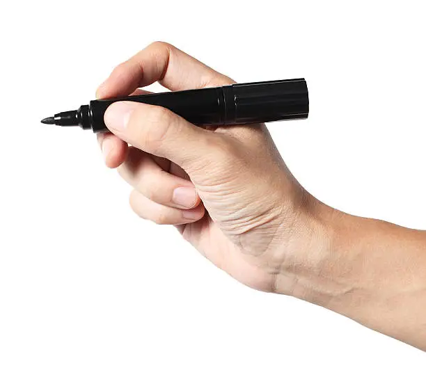 "Male hand holding a felt tip pen, isolated on white background. Clipping path included."