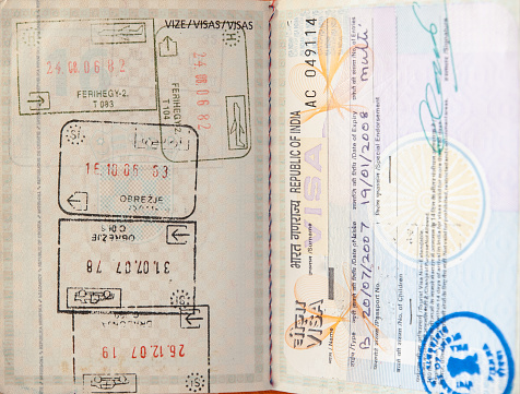 Indian visa and stamps in a Croatian passport