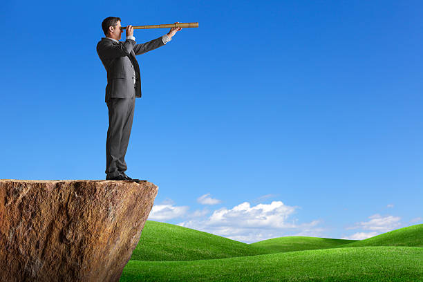 istock Businessman Searching Through Telescope 175512967