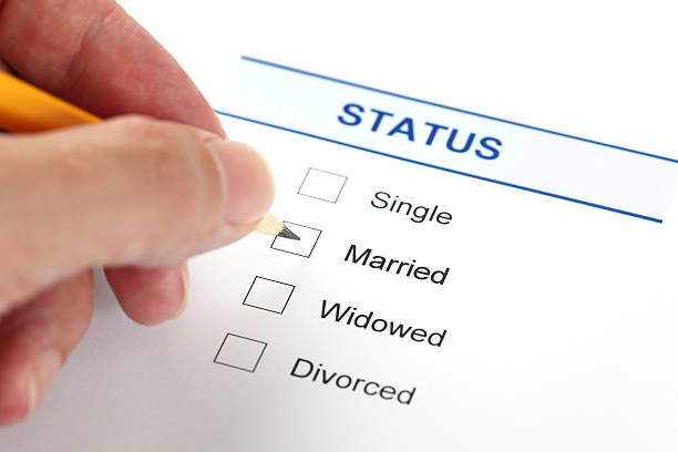 A form filling out a person's marital status stock photo