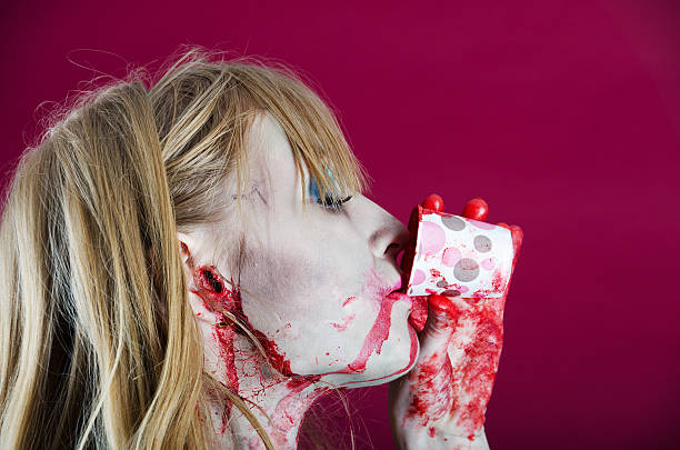 istock Horizontal closeup of Zombie Alice drinking. 175513335