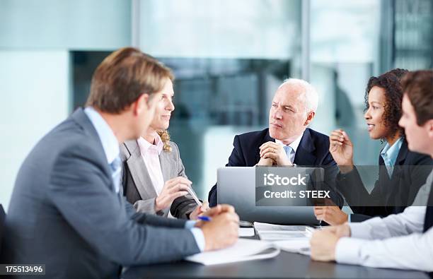 Listening To An Interesting Proposal Stock Photo - Download Image Now - Business Person, Active Seniors, Adult