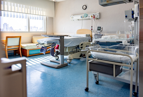 Maternity room at the hospital - healthcare and medicine concepts