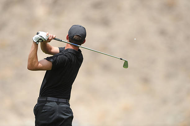Golfer swing stock photo