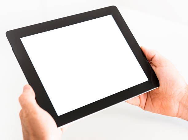 istock Human hand holding black digital tablet with blank screen 175516554