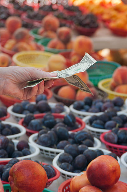 istock Paying for Fruit at Farmers Market 175517178