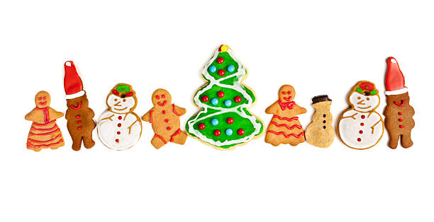 istock Happy Gingerbread Man Snowman and Christmas Tree Cookies on White 175517313