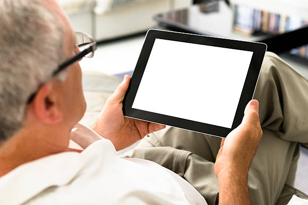 istock Human hand holding black digital tablet with blank screen 175517416