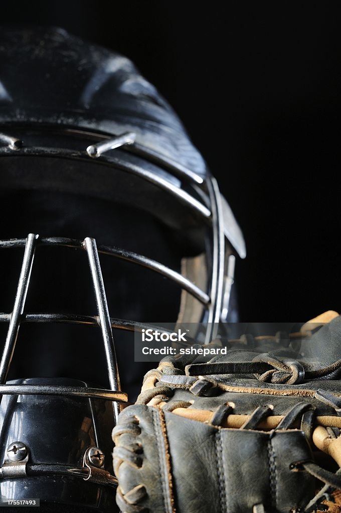 Baseball catchers mask and glove "Close up of baseball glove and catchers mask, vertical." Baseball - Sport Stock Photo