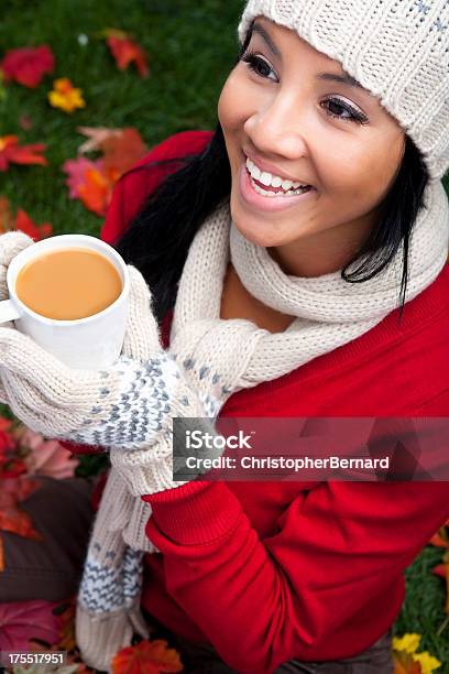 Autumn Smiling Woman Drinking Coffee Stock Photo - Download Image Now - 20-24 Years, Adult, Adults Only