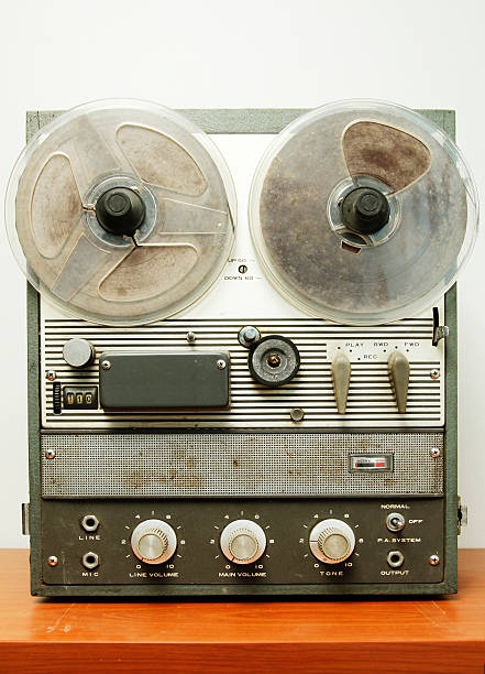 Old Recording Machine "Old, antique sound recording machine on a table" reel to reel tape stock pictures, royalty-free photos & images