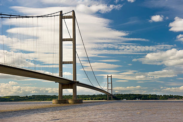 A view of the iconic Humber Bridge in England seen from the south bank of the River Humber.