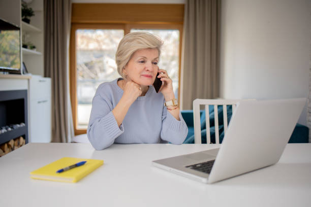 istock Mature woman working from home 1755196360