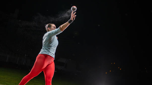 istock Female athlete throwing shot put 1755196956