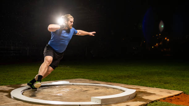 istock Track and field male athlete throwing shot put 1755196958