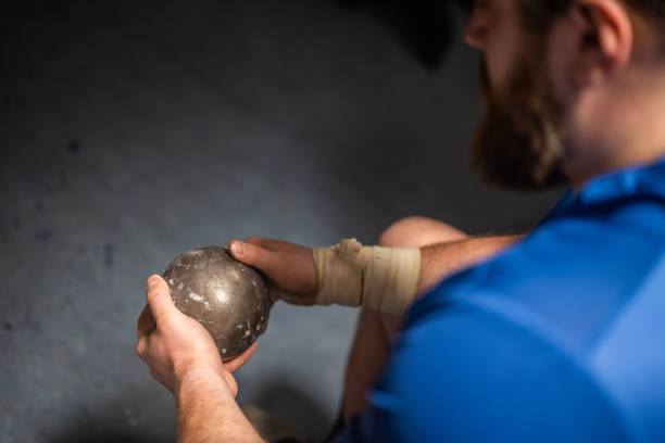 istock Sportsman holding shot put in hands 1755197010