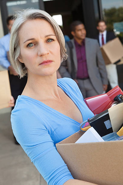 istock Mature women leaving office after layoff or being fired 175519824