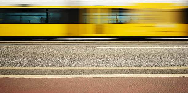 Motion blurred Berlin tram "Environment friendly tram on bridge, motion blurred" blurred motion street car green stock pictures, royalty-free photos & images