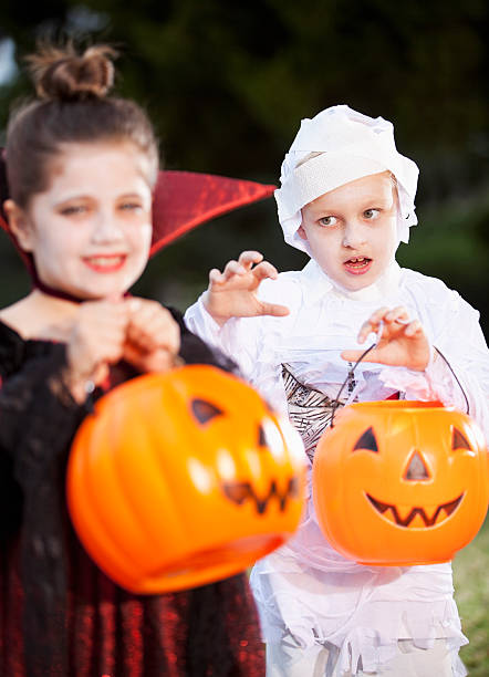 istock Children in halloween costumes 175520572