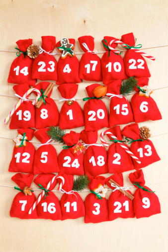 advent calendar with little bags strung on a cord