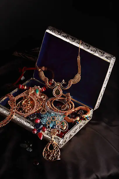 "Treasure chest full of jewels, jewelry and other personal accessories."