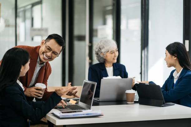 istock Business meeting account managers crew working search page on computer with new startup project. Idea presentation, analyze plans. 1755211367