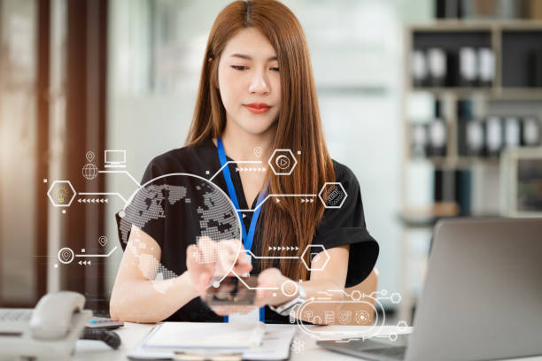 istock Learning online working concept. Businesswoman working on tablet and laptop computer, searching working in office. 1755211917